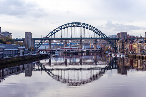 Tyne Bridge mirrored into the River Tyne in Newcastle.