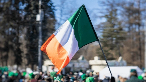 Irish-flag-held-above-crowd-outside