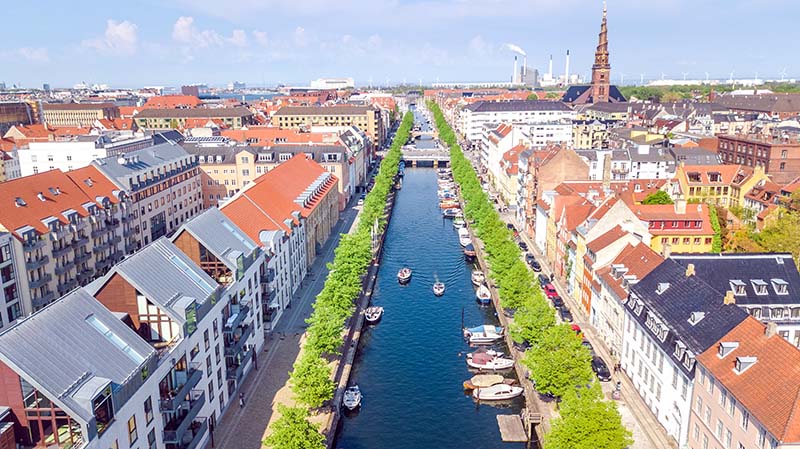 beautiful-aerial-view-copenhagen-skyline-from-nyhavn-historical-pier-port-canal-with-color-buildings-boats-old-town-copenhagen-denmark